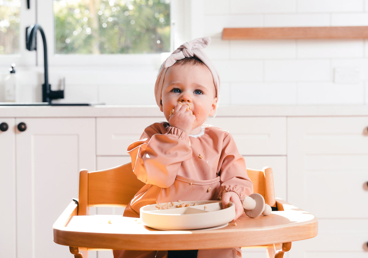 Kubaii sleeved bib terracotta