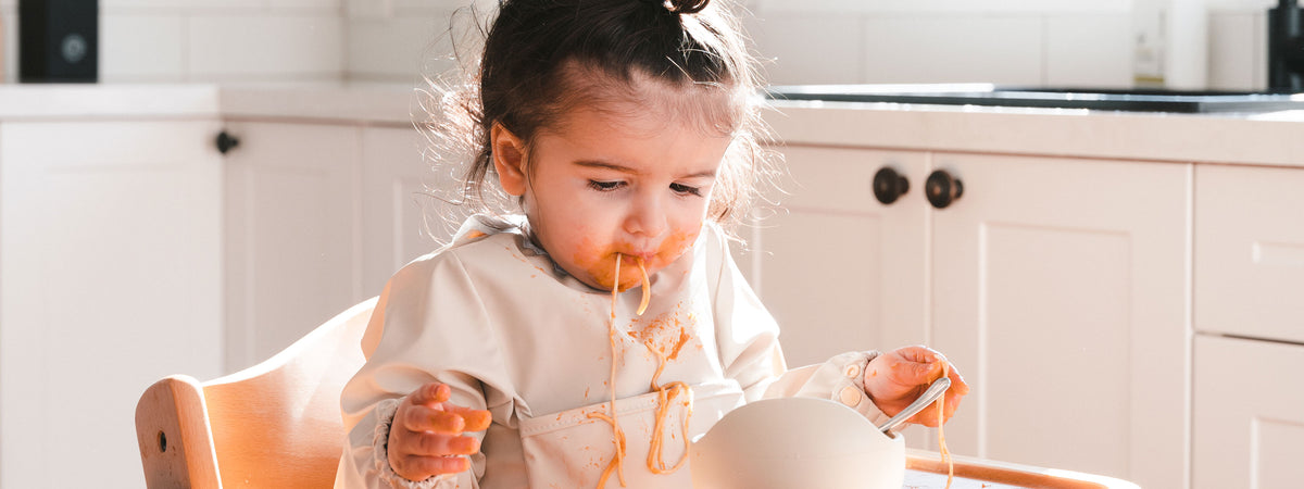 Kubaii sleeved bib for baby led weaning